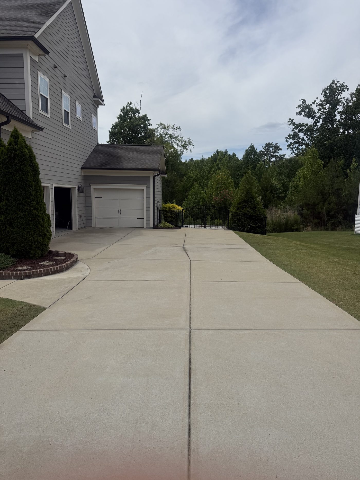 Driveway after pressure washing