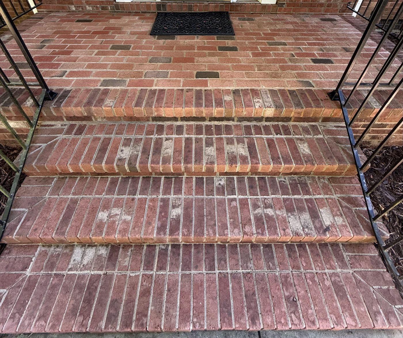 Brick front steps after pressure washing